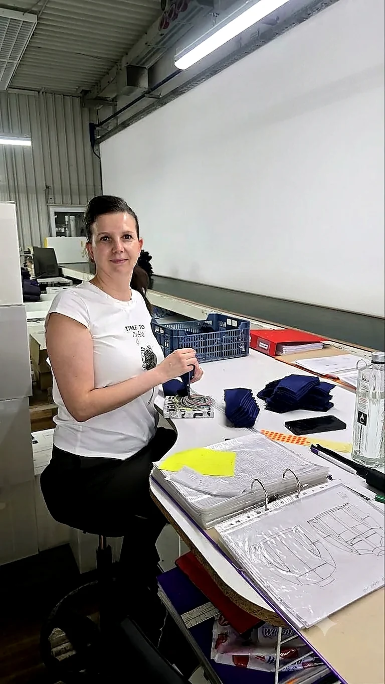 Quality manager reviewing technical documentation at Eco Textil Grup